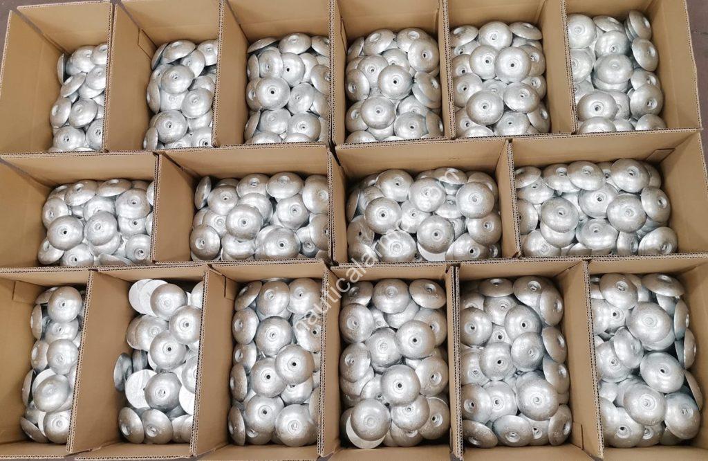Nautical Armor boxes filled with round rudder sacrificial anodes prepared for dispatch.