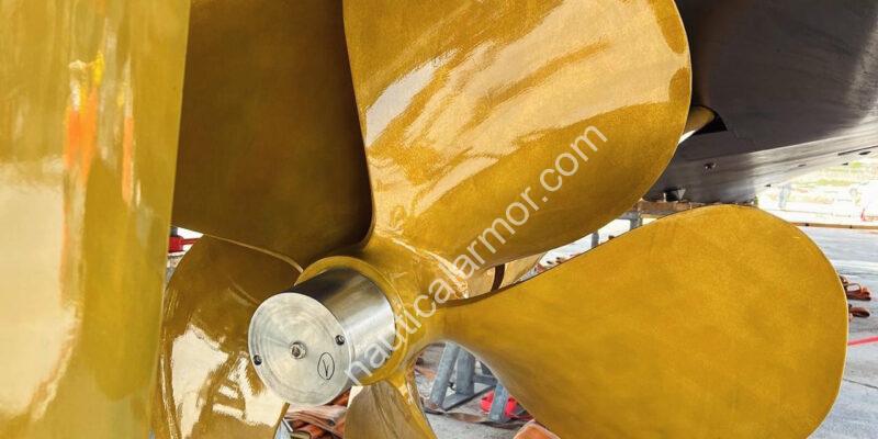 Nautical Armor custom propeller anode set installed on a superyacht propeller in dry dock.