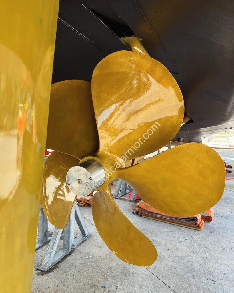 Nautical Armor custom propeller anode set installed on a superyacht propeller in dry dock.