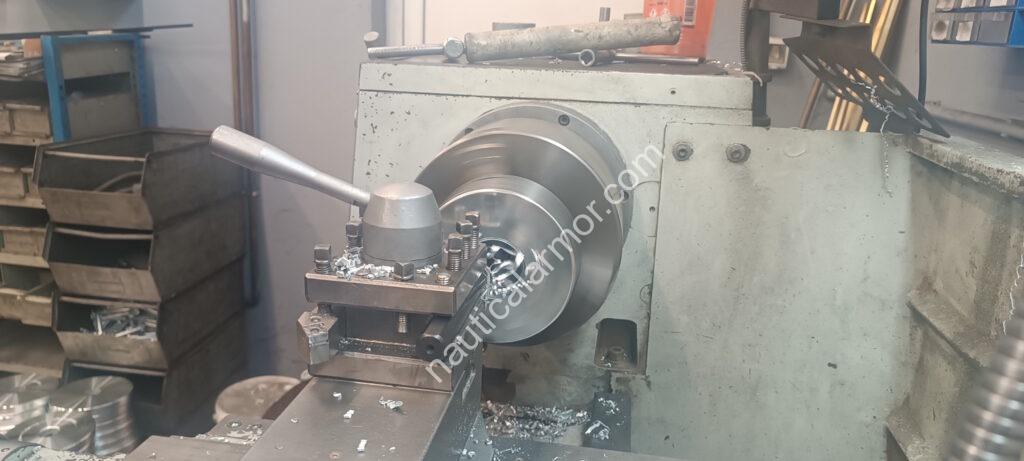 Nautical Armor machining process producing stern anodes on a workshop lathe.