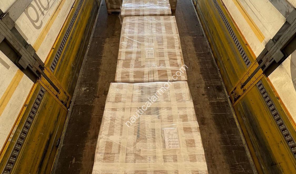 Wrapped pallets of Nautical Armor boxed anodes lined up inside a truck trailer, ready for shipment