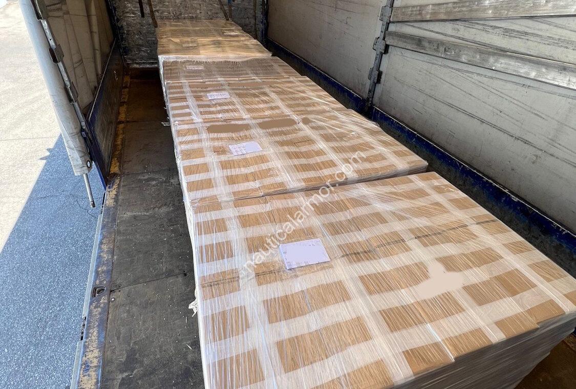 Seven wrapped pallets of Nautical Armor sacrificial anodes loaded on a truck for shipment.