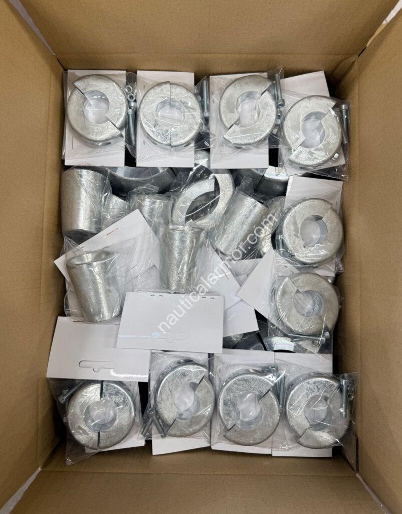 Nautical Armor shaft and propeller sacrificial anodes packed in plastic bags inside a cardboard box.